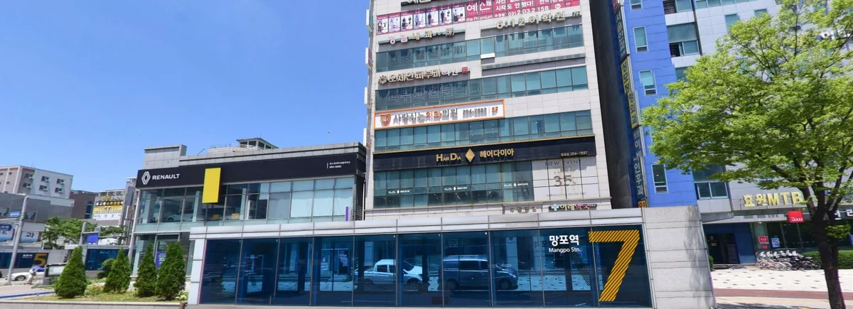 Exterior of Sujeong Building, Yeongtong-ro 214beon-gil, where Ochean Dermatology Clinic Suwon is located